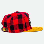 Side view that shows the leather strap of the Buffalo Flannel Remedy Hat
