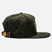 Side view with Leather Strap of the Olive Corduroy Remedy Hat