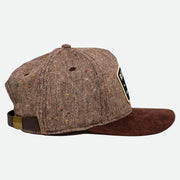 Side view showing leather strap of the Tweed Remedy Hat