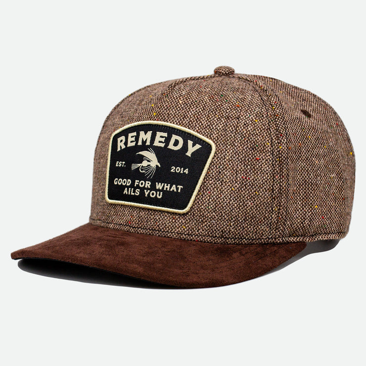Side view of the tweed Remedy Hat