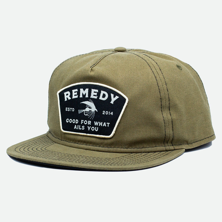 Side view of the waxed canvas olive Remedy Hat