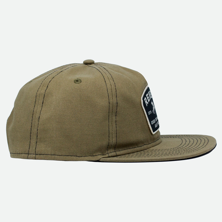 Side view of the Olive Waxed Canvas Snapback Remedy Hat